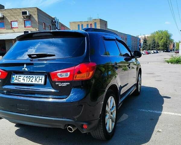 Черный Мицубиси Outlander Sport, объемом двигателя 2 л и пробегом 107 тыс. км за 12900 $, фото 3 на Automoto.ua
