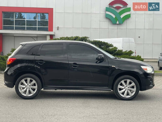 Черный Мицубиси Outlander Sport, объемом двигателя 2 л и пробегом 205 тыс. км за 10750 $, фото 7 на Automoto.ua