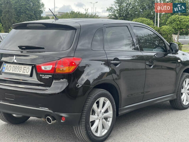 Черный Мицубиси Outlander Sport, объемом двигателя 2 л и пробегом 205 тыс. км за 10750 $, фото 8 на Automoto.ua