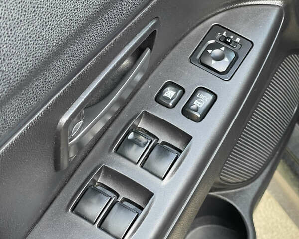 Черный Мицубиси Outlander Sport, объемом двигателя 2 л и пробегом 205 тыс. км за 10750 $, фото 16 на Automoto.ua