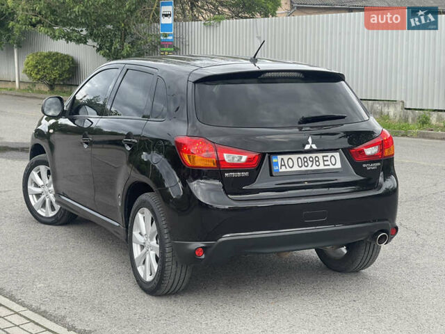 Черный Мицубиси Outlander Sport, объемом двигателя 2 л и пробегом 205 тыс. км за 10750 $, фото 2 на Automoto.ua