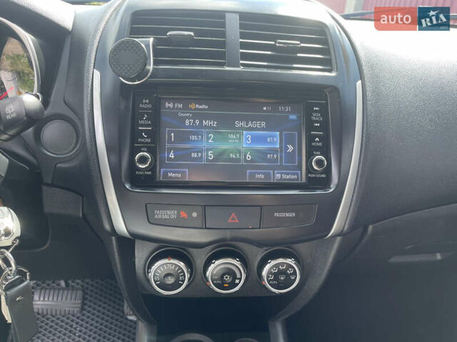 Черный Мицубиси Outlander Sport, объемом двигателя 2 л и пробегом 205 тыс. км за 10750 $, фото 15 на Automoto.ua