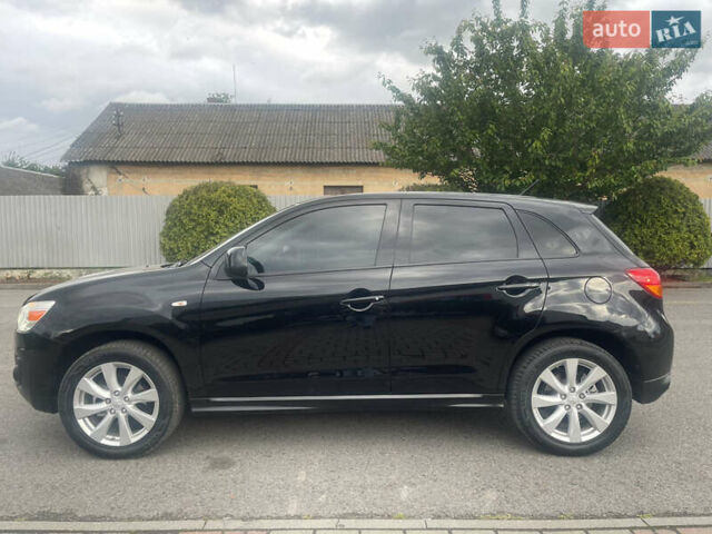 Черный Мицубиси Outlander Sport, объемом двигателя 2 л и пробегом 205 тыс. км за 10750 $, фото 5 на Automoto.ua