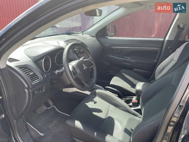 Черный Мицубиси Outlander Sport, объемом двигателя 2 л и пробегом 205 тыс. км за 10750 $, фото 13 на Automoto.ua