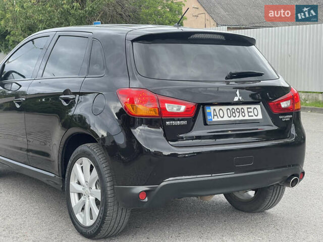 Черный Мицубиси Outlander Sport, объемом двигателя 2 л и пробегом 205 тыс. км за 10750 $, фото 9 на Automoto.ua
