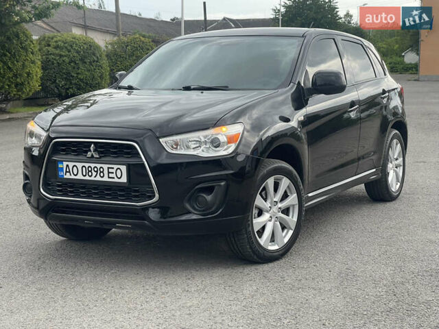 Черный Мицубиси Outlander Sport, объемом двигателя 2 л и пробегом 205 тыс. км за 10750 $, фото 1 на Automoto.ua