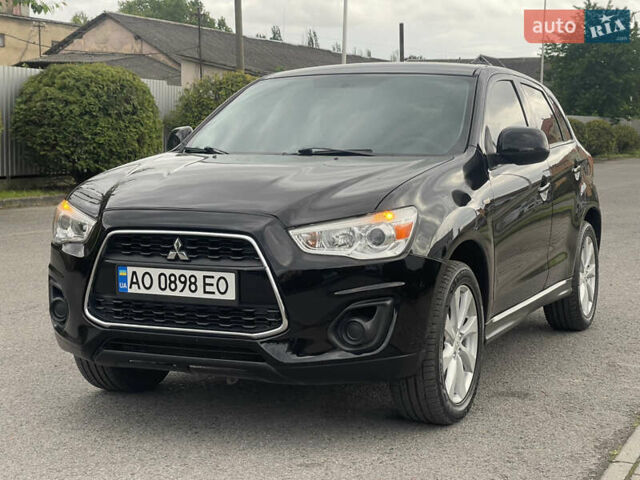 Черный Мицубиси Outlander Sport, объемом двигателя 2 л и пробегом 205 тыс. км за 10750 $, фото 10 на Automoto.ua