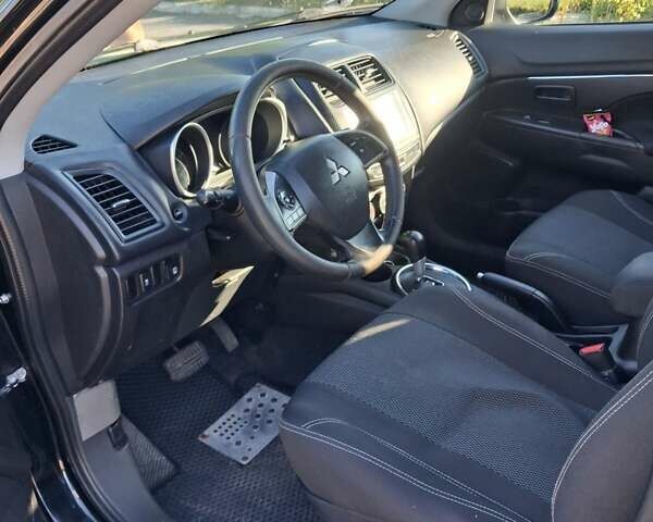 Черный Мицубиси Outlander Sport, объемом двигателя 1.97 л и пробегом 80 тыс. км за 12000 $, фото 4 на Automoto.ua