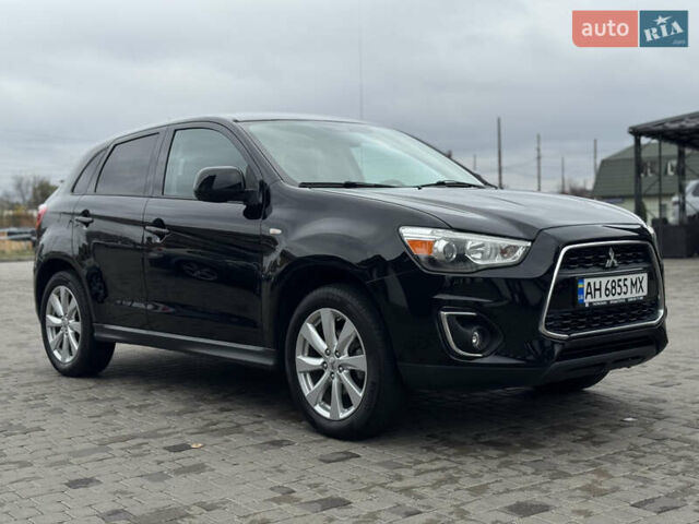 Черный Мицубиси Outlander Sport, объемом двигателя 2 л и пробегом 157 тыс. км за 11900 $, фото 6 на Automoto.ua