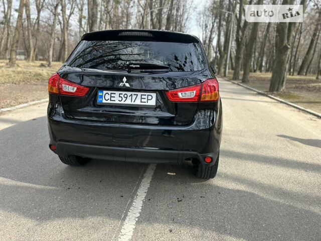 Чорний Міцубісі Outlander Sport, об'ємом двигуна 2 л та пробігом 144 тис. км за 12150 $, фото 8 на Automoto.ua