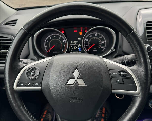 Черный Мицубиси Outlander Sport, объемом двигателя 2 л и пробегом 157 тыс. км за 11900 $, фото 19 на Automoto.ua
