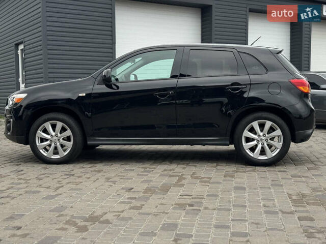 Черный Мицубиси Outlander Sport, объемом двигателя 2 л и пробегом 157 тыс. км за 11900 $, фото 1 на Automoto.ua