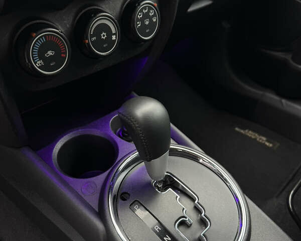 Черный Мицубиси Outlander Sport, объемом двигателя 2 л и пробегом 157 тыс. км за 11900 $, фото 26 на Automoto.ua