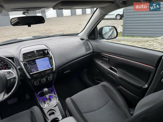 Черный Мицубиси Outlander Sport, объемом двигателя 2 л и пробегом 157 тыс. км за 11900 $, фото 13 на Automoto.ua