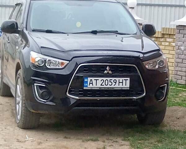 Черный Мицубиси Outlander Sport, объемом двигателя 2 л и пробегом 225 тыс. км за 11200 $, фото 4 на Automoto.ua