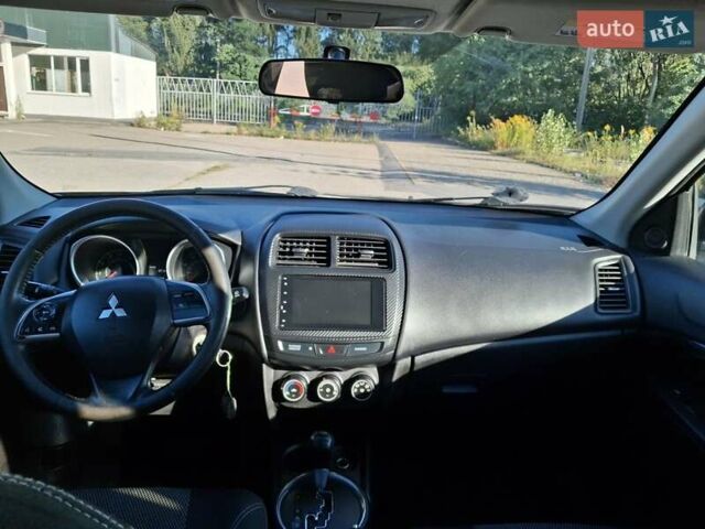 Черный Мицубиси Outlander Sport, объемом двигателя 1.97 л и пробегом 80 тыс. км за 12000 $, фото 2 на Automoto.ua
