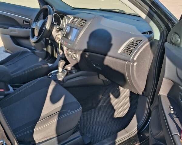 Черный Мицубиси Outlander Sport, объемом двигателя 1.97 л и пробегом 80 тыс. км за 12000 $, фото 5 на Automoto.ua