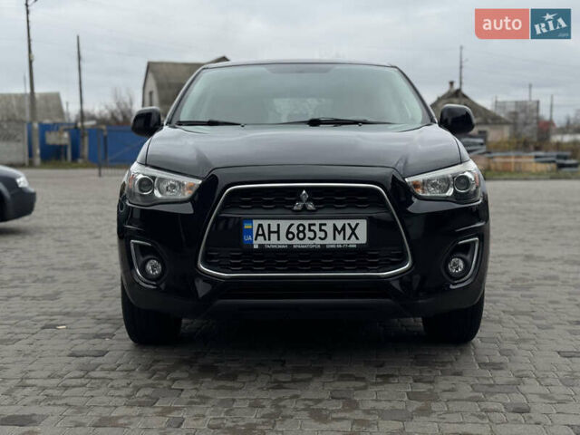 Черный Мицубиси Outlander Sport, объемом двигателя 2 л и пробегом 157 тыс. км за 11900 $, фото 7 на Automoto.ua