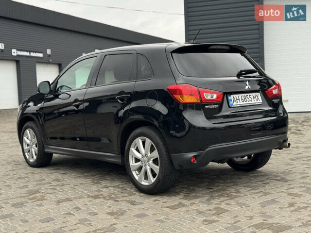 Черный Мицубиси Outlander Sport, объемом двигателя 2 л и пробегом 157 тыс. км за 11900 $, фото 2 на Automoto.ua