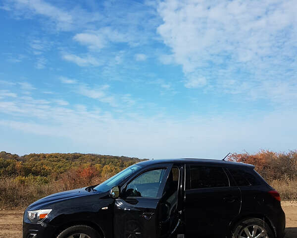 Черный Мицубиси Outlander Sport, объемом двигателя 2.4 л и пробегом 204 тыс. км за 11900 $, фото 2 на Automoto.ua