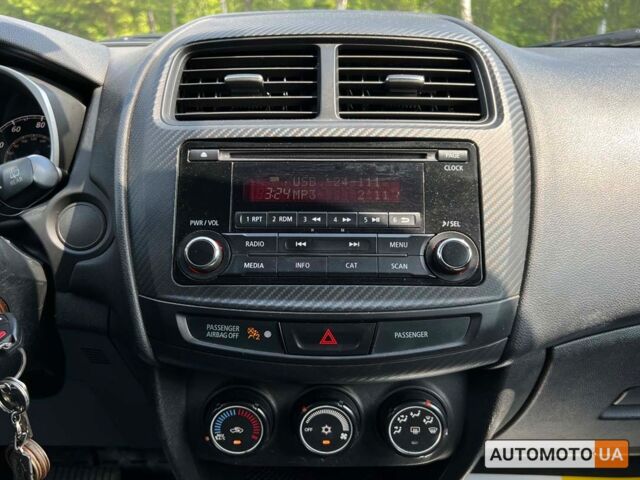Чорний Міцубісі Outlander Sport, об'ємом двигуна 2 л та пробігом 120 тис. км за 11699 $, фото 14 на Automoto.ua