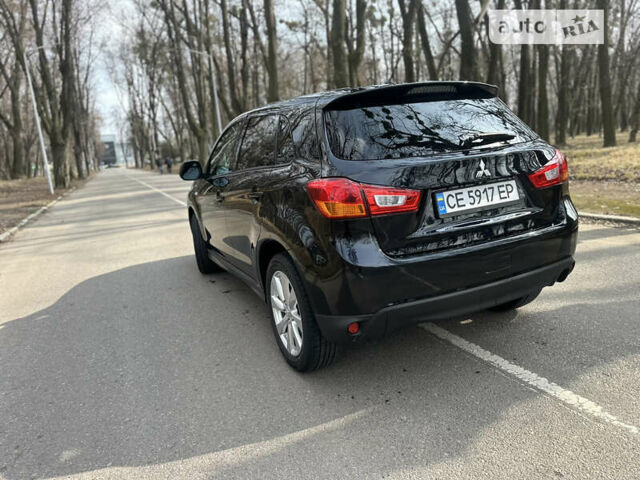 Чорний Міцубісі Outlander Sport, об'ємом двигуна 2 л та пробігом 144 тис. км за 12150 $, фото 13 на Automoto.ua