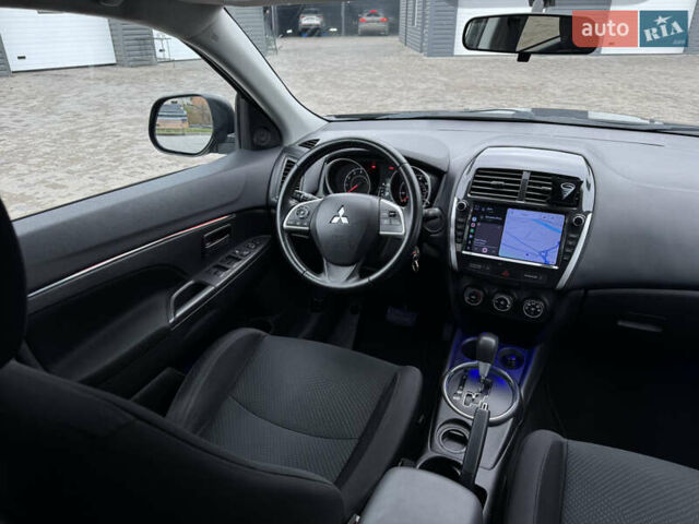 Черный Мицубиси Outlander Sport, объемом двигателя 2 л и пробегом 157 тыс. км за 11900 $, фото 12 на Automoto.ua