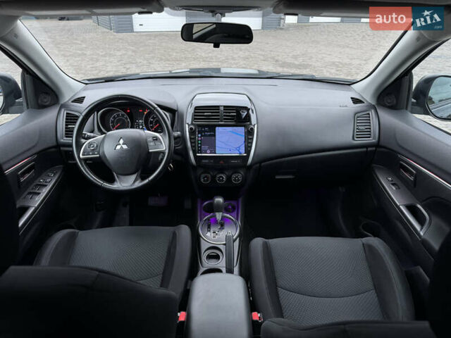 Черный Мицубиси Outlander Sport, объемом двигателя 2 л и пробегом 157 тыс. км за 11900 $, фото 11 на Automoto.ua