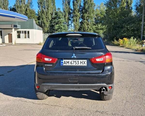 Черный Мицубиси Outlander Sport, объемом двигателя 1.97 л и пробегом 80 тыс. км за 12000 $, фото 6 на Automoto.ua