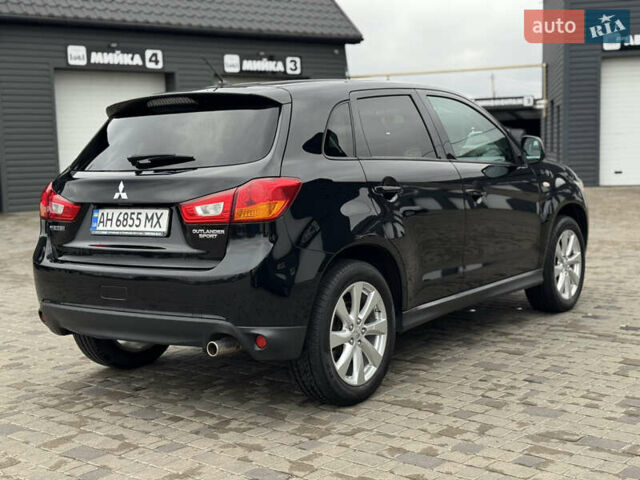 Черный Мицубиси Outlander Sport, объемом двигателя 2 л и пробегом 157 тыс. км за 11900 $, фото 4 на Automoto.ua