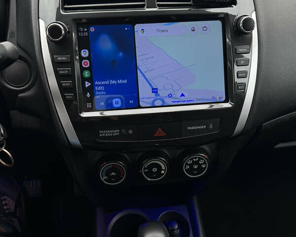 Черный Мицубиси Outlander Sport, объемом двигателя 2 л и пробегом 157 тыс. км за 11900 $, фото 18 на Automoto.ua