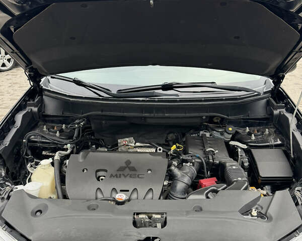 Черный Мицубиси Outlander Sport, объемом двигателя 2 л и пробегом 157 тыс. км за 11900 $, фото 23 на Automoto.ua