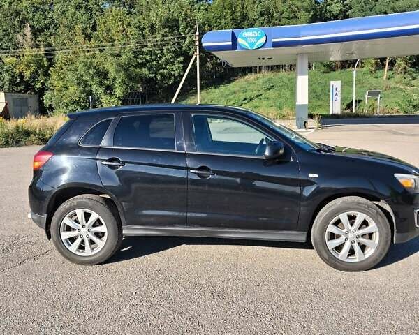 Черный Мицубиси Outlander Sport, объемом двигателя 1.97 л и пробегом 80 тыс. км за 12000 $, фото 7 на Automoto.ua