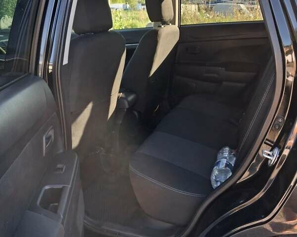 Черный Мицубиси Outlander Sport, объемом двигателя 1.97 л и пробегом 80 тыс. км за 12000 $, фото 1 на Automoto.ua