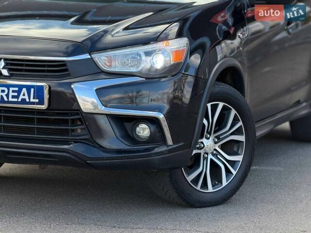 Черный Мицубиси Outlander Sport, объемом двигателя 2.4 л и пробегом 230 тыс. км за 14200 $, фото 4 на Automoto.ua