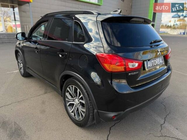 Черный Мицубиси Outlander Sport, объемом двигателя 2.4 л и пробегом 230 тыс. км за 14200 $, фото 25 на Automoto.ua