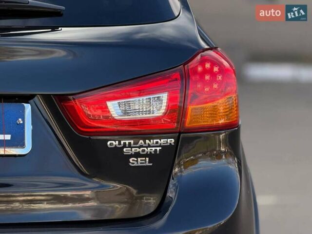 Черный Мицубиси Outlander Sport, объемом двигателя 2.4 л и пробегом 230 тыс. км за 14200 $, фото 20 на Automoto.ua
