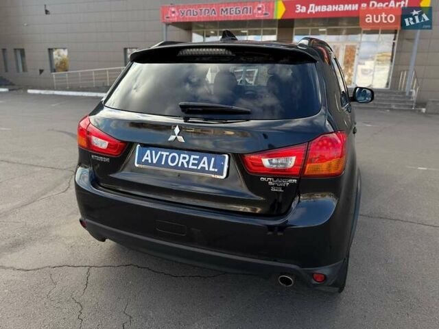 Черный Мицубиси Outlander Sport, объемом двигателя 2.4 л и пробегом 230 тыс. км за 14200 $, фото 23 на Automoto.ua