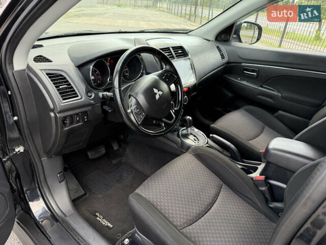 Черный Мицубиси Outlander Sport, объемом двигателя 2 л и пробегом 90 тыс. км за 11900 $, фото 11 на Automoto.ua