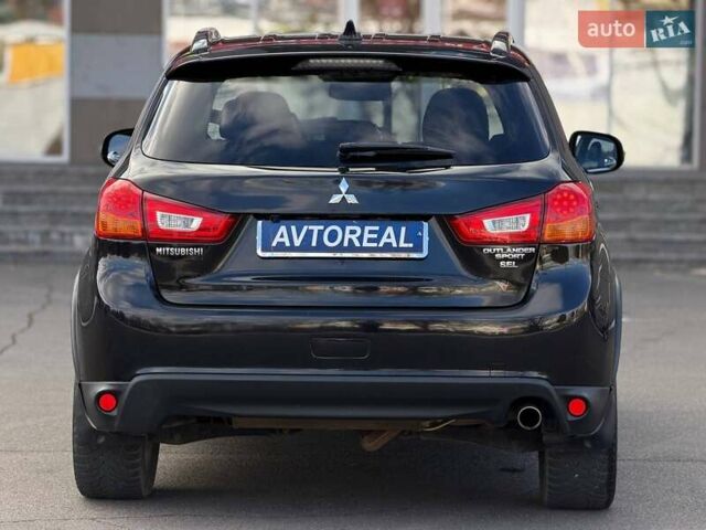 Черный Мицубиси Outlander Sport, объемом двигателя 2.4 л и пробегом 230 тыс. км за 14200 $, фото 17 на Automoto.ua