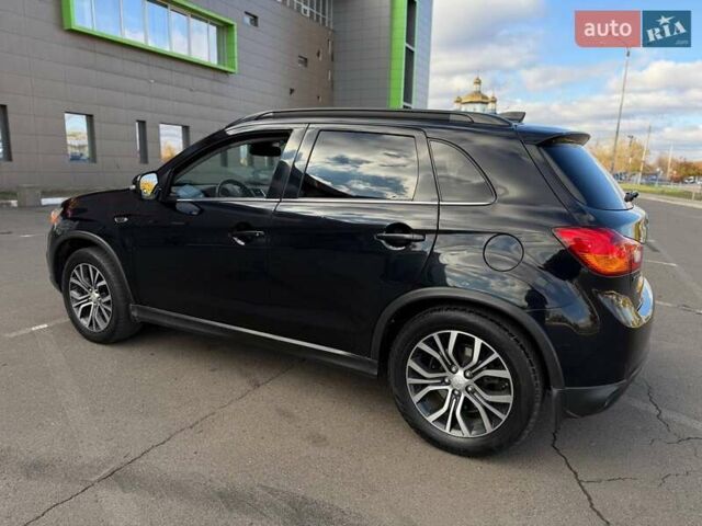 Черный Мицубиси Outlander Sport, объемом двигателя 2.4 л и пробегом 230 тыс. км за 14200 $, фото 26 на Automoto.ua