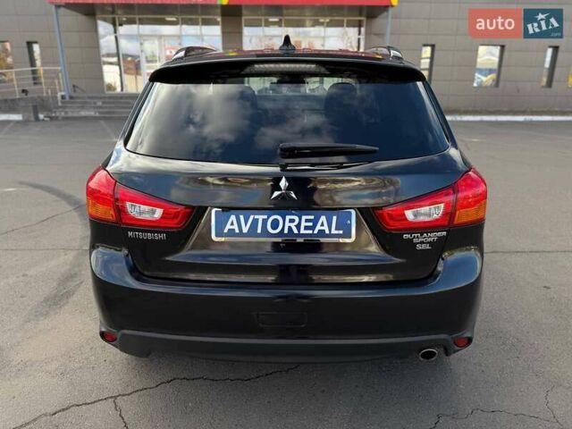 Черный Мицубиси Outlander Sport, объемом двигателя 2.4 л и пробегом 230 тыс. км за 14200 $, фото 24 на Automoto.ua