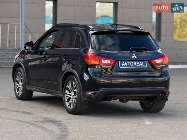 Черный Мицубиси Outlander Sport, объемом двигателя 2.4 л и пробегом 230 тыс. км за 14200 $, фото 18 на Automoto.ua