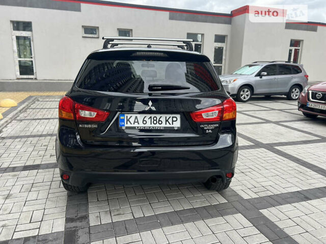 Черный Мицубиси Outlander Sport, объемом двигателя 2.4 л и пробегом 107 тыс. км за 11650 $, фото 15 на Automoto.ua