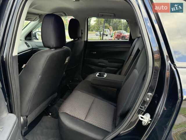Черный Мицубиси Outlander Sport, объемом двигателя 2 л и пробегом 90 тыс. км за 11900 $, фото 19 на Automoto.ua