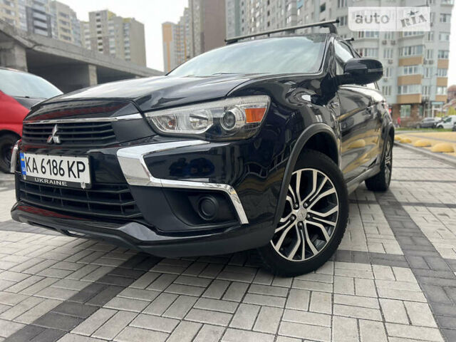 Черный Мицубиси Outlander Sport, объемом двигателя 2.4 л и пробегом 107 тыс. км за 11650 $, фото 5 на Automoto.ua