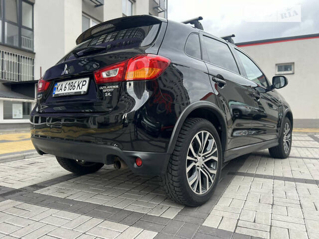 Черный Мицубиси Outlander Sport, объемом двигателя 2.4 л и пробегом 107 тыс. км за 11650 $, фото 13 на Automoto.ua