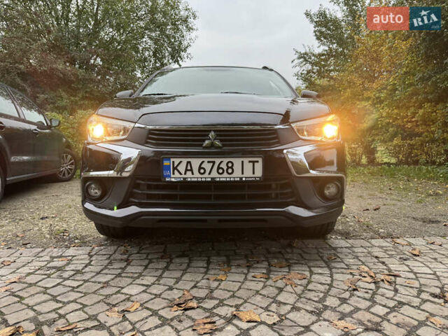 Черный Мицубиси Outlander Sport, объемом двигателя 2.4 л и пробегом 140 тыс. км за 11000 $, фото 11 на Automoto.ua