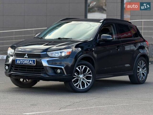 Черный Мицубиси Outlander Sport, объемом двигателя 2.4 л и пробегом 230 тыс. км за 14200 $, фото 1 на Automoto.ua