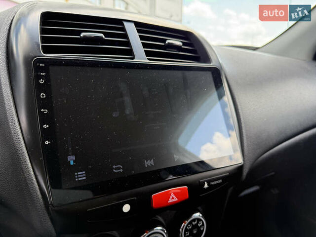 Черный Мицубиси Outlander Sport, объемом двигателя 2 л и пробегом 90 тыс. км за 11900 $, фото 17 на Automoto.ua